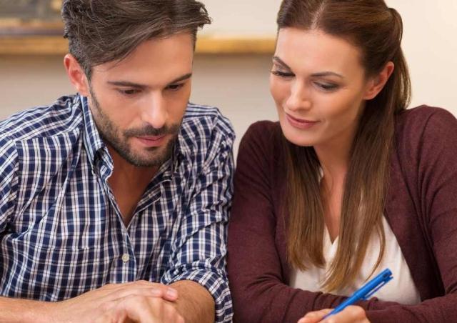 Couple reviewing their financial accounts.